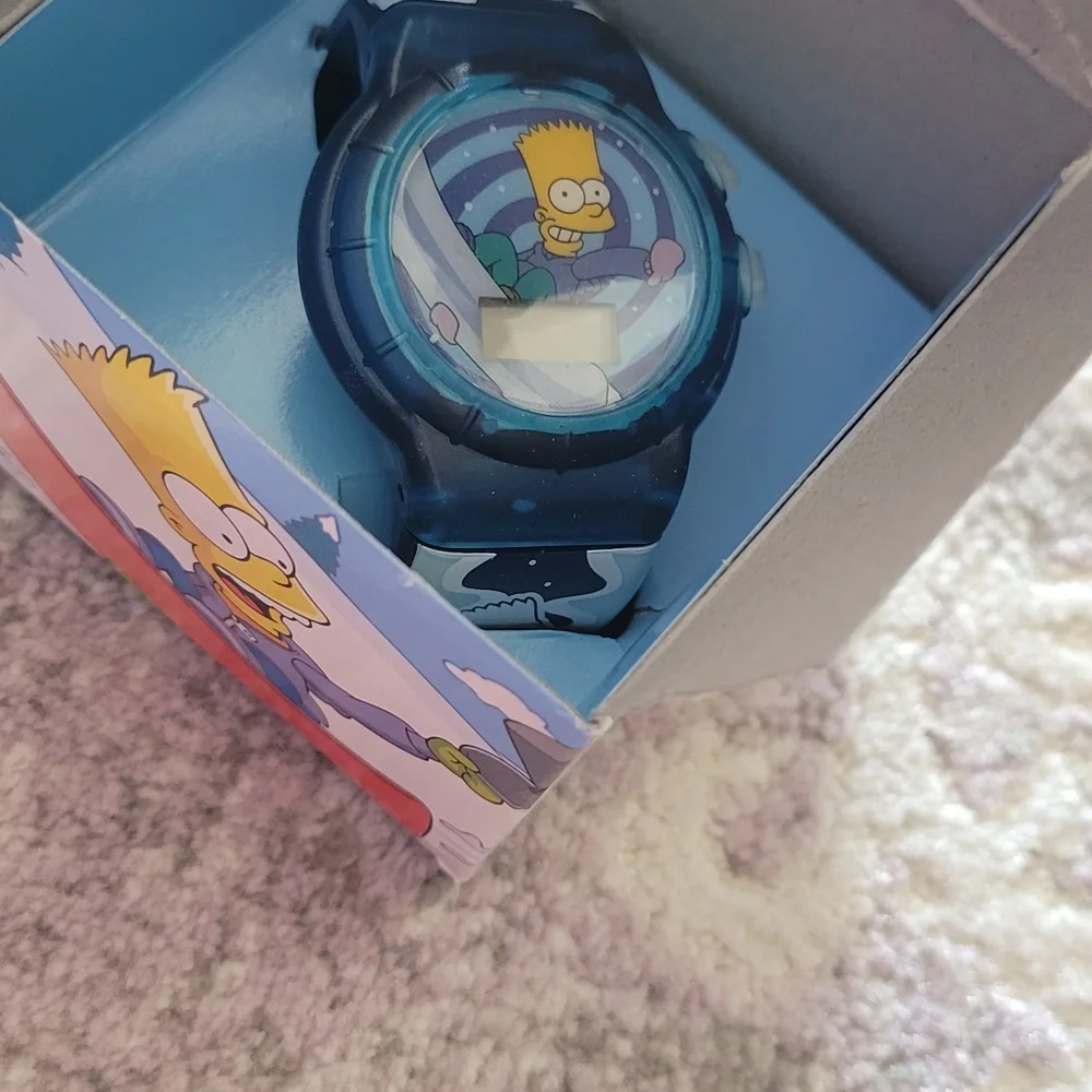 Homer & Bart Simpson talking watchs, in orginal boxes.